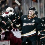 Anaheim Ducks center Ryan Getzlaf (24) is congratulated by his teammates after scoring during the first period of their NHL hockey game against the Phoenix Coyotes, Sunday, Oct. 23, 2011, in Anaheim, Calif. (AP Photo/Bret Hartman)