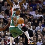 Miami Heat's Udonis Haslem (40) defends a drive by Boston Celtics' Rajon Rondo (9) during the first half of an NBA basketball game, Tuesday, Oct. 30, 2012, in Miami. (AP Photo/J Pat Carter)