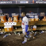 Los Angeles Dodgers' Yasiel Puig walks out of the dugout after Game 6 of the National League baseball championship series against the St. Louis Cardinals, Friday, Oct. 18, 2013, in St. Louis. The Cardinals won 9-0 to win the series. (AP Photo/David J. Phillip)