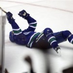 Vancouver Canucks' Henrik Sedin celebrates his goal against the Phoenix Coyotes during second period NHL hockey action in Vancouver, British Columbia, on Friday Dec. 6, 2013. (AP Photo/The Canadian Press, Ben Nelms)
