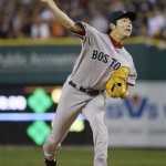  Boston Red Sox relief pitcher Koji Uehara throws in the ninth inning during Game 3 of the American League baseball championship series against the Detroit Tigers Tuesday, Oct. 15, 2013, in Detroit. The Red Sox won 1-0. (AP Photo/Matt Slocum)