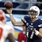  San Diego Chargers quarterback Philip Rivers fires a short pass during the overtime period of an NFL football game that the Chargers won 27-24 in overtime against the Kansas City Chiefs, Sunday, Dec. 29, 2013, in San Diego. (AP Photo/Lenny Ignelzi)