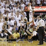 Miami Heat shooting guard Ray Allen (34) shoots a three-point basket in the end of regulation during the second half of Game 6 of the NBA Finals basketball game against the San Antonio Spurs, Wednesday, June 19, 2013 in Miami. (AP Photo/Lynne Sladky