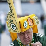 Green Bay Packers fan Gene Greening cheers before NFL football game against the Chicago Bears Monday, Nov. 4, 2013, in Green Bay, Wis. (AP Photo/Mike Roemer)