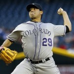 Colorado Rockies' Jorge De La Rosa delivers a pitch against the Arizona Diamondbacks during the first the inning of a baseball game, Thursday, April 25, 2013, in Phoenix. (AP Photo/Matt York)