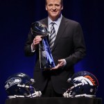  NFL comissioner Roger Goodell holds the Vince Lombardi Trophy at a news conference Friday, Jan. 31, 2014, in New York. The Seattle Seahawks are scheduled to play the Denver Broncos in the NFL Super Bowl XLVIII football game on Sunday, Feb. 2, at MetLife Stadium in East Rutherford, N.J. (AP Photo/Matt Slocum)