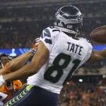 Denver Broncos' Tony Carter, left, breaks up a pass intended for Seattle Seahawks' Golden Tate (81) during the first half of the NFL Super Bowl XLVIII football game Sunday, Feb. 2, 2014, in East Rutherford, N.J. Carter was called for interference on the play. (AP Photo/Evan Vucci)