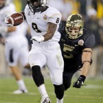Central Florida running back Storm Johnson (8) breaks free from Baylor linebacker Eddie Lackey (5) for a touchdown during the first half of the Fiesta Bowl NCAA college football game, Wednesday, Jan. 1, 2014, in Glendale, Ariz. (AP Photo/Matt York)