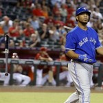 Toronto Blue Jays' Edwin Encarnacion tosses the bat away after striking out looking in the sixth inning of a baseball game against the Arizona Diamondbacks, Wednesday, Sept. 4, 2013, in Phoenix. (AP Photo/Ross D. Franklin)