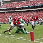 Georgia running back Todd Gurley runs through the tackle of North Texas' Zach Orr (35) for a 12-yard touchdown run in the first quarter of an NCAA college football game at Sanford Stadium Saturday, Sept. 21, 2013, in Athens, Ga. (AP Photo/Atlanta Journal-Constitution, Jason Getz)
