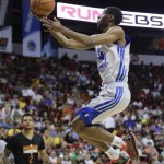 Golden State Warriors' Ian Clark goes up for a shot against the Phoenix Suns in the second quarter of the NBA Summer League championship game, Monday, July 22, 2013, in Las Vegas. (AP Photo/Julie Jacobson)