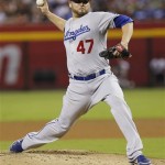 Los Angeles Dodgers pitcher Ricky Nolasco delivers a pitch against the Arizona Diamondbacks during the first inning of a baseball game, Tuesday, July 9, 2013, in Phoenix. (AP Photo/Matt York)