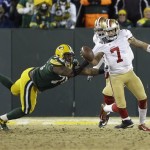  Green Bay Packers defensive end Mike Daniels (76) sacks San Francisco 49ers quarterback Colin Kaepernick (7) during the second half of an NFL wild-card playoff football game, Sunday, Jan. 5, 2014, in Green Bay, Wis. (AP Photo/Mike Roemer)