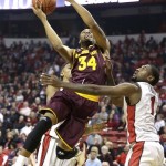  Arizona State's Jermaine Marshall shoots over UNLV's Roscoe Smith during the first half of an NCAA college basketball game on Tuesday, Nov. 19, 2013, in Las Vegas. (AP Photo/Isaac Brekken)