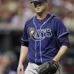 Tampa Bay Rays starting pitcher Alex Cobb heads to the dugout after retiring the Cleveland Indians in order in the sixth inning of the AL wild-card baseball game Wednesday, Oct. 2, 2013, in Cleveland. (AP Photo/Tony Dejak)