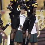 Arizona State wide receiver Kevin Ozier, left, celebrates his touchdown with teammate Rashad Ross against Oregon during the first half of an NCAA college football game, Thursday, Oct. 18, 2012, in Tempe, Ariz. (AP Photo/Matt York)