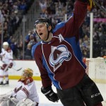  Colorado Avalanche center Paul Stastny celebrates a goal against Phoenix Coyotes goalie Thomas Greiss during the third period of an NHL hockey game on Friday, Feb. 28, 2014, in Denver. (AP Photo/Jack Dempsey)
