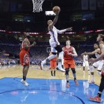 Oklahoma City Thunder guard Russell Westbrook (0) drives the lane against the Houston Rockets in the first quarter of Game 1 of their first-round NBA basketball playoff series in Oklahoma City, Sunday, April 21, 2013. (AP Photo/Sue Ogrocki)