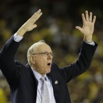 Syracuse head coach Jim Boeheim reacts to play against Michigan during the first half of the NCAA Final Four tournament college basketball semifinal game Saturday, April 6, 2013, in Atlanta. (AP Photo/David J. Phillip)
