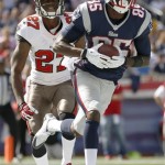 New England Patriots wide receiver Kenbrell Thompkins (85) makes his second touchdown catch in front of Tampa Bay Buccaneers cornerback Johnthan Banks (27) in the first half of an NFL football game Sunday, Sept. 22, 2013, in Foxborough, Mass. (AP Photo/Elise Amendola)