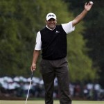 Angel Cabrera, of Argentina, holds up his ball after birdie putt on the 18th hole during the fourth round of the Masters golf tournament Sunday, April 14, 2013, in Augusta, Ga. (AP Photo/Darron Cummings)