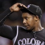 Colorado Rockies starting pitcher Juan Nicasio reacts after a meeting at the mound during the third inning of a baseball game against the Arizona Diamondbacks, Friday, April 13, 2012, in Denver. Nicasio was pulled after the next batter. (AP Photo/Jack Dempsey)