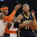 Indiana Pacers' David West, right, drives against New York Knicks' Carmelo Anthony in the first half of Game 5 of an Eastern Conference semifinal in the NBA basketball playoffs, at Madison Square Garden in New York, Thursday, May 16, 2013. (AP Photo/Julio Cortez)