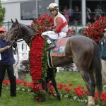 Joel Rosario sits on Orb in the winners circle after winning the 139th Kentucky Derby at Churchill Downs Saturday, May 4, 2013, in Louisville, Ky. (AP Photo/J. David Ake)
