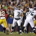 Seattle Seahawks quarterback Russell Wilson passes the ball during the second half of an NFL wild card playoff football game against the Washington Redskins in Landover, Md., Sunday, Jan. 6, 2013. (AP Photo/Evan Vucci)