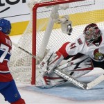Ottawa Senators' goaltender Craig Anderson, right, is scored on by Montreal Canadiens' Michael Ryder, left, during second-period NHL hockey Game 2 first-round playoff action in Montreal, Friday, May 3, 2013. (AP Photo/The Canadian Press, Graham Hughes)