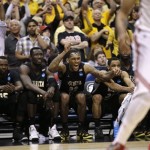 Wichita State players react from the bench during the second half against Ohio State in the West Regional final in the NCAA men's college basketball tournament, Saturday, March 30, 2013, in Los Angeles. (AP Photo/Jae C. Hong)