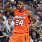 Louisville's Chane Behanan celebrates his team's 57-44 win over Michigan State in an NCAA men's college basketball tournament West Regional semifinal on Thursday, March 22, 2012, in Phoenix. Behanan scored 15 points. (AP Photo/Chris Carlson)