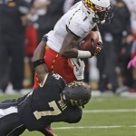 Maryland's Stefon Diggs (1) is tackled by Wake Forest's Merrill Noel (7) in the second half of an NCAA college football game in Winston-Salem, N.C., Saturday, Oct. 19, 2013. Wake Forest won 34-10. (AP Photo/Chuck Burton)