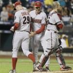 Arizona Diamondbacks manager Kirk Gibson takes relief pitcher Brad Ziegler (29) out of the game during the seventh inning of a baseball game against the New York Mets Tuesday, July 2, 2013, in New York. (AP Photo/Frank Franklin II)