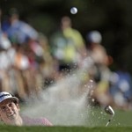 Gonzalo Fernandez-Castano, of Spain, hits out of a bunker on the 18th hole during the third round of the Masters golf tournament Saturday, April 13, 2013, in Augusta, Ga. (AP Photo/David Goldman)
