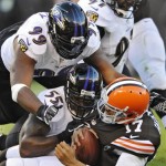  Baltimore Ravens defensive end Chris Canty (99) and outside linebacker Terrell Suggs (55) sack Cleveland Browns quarterback Jason Campbell in the first quarter of an NFL football game Sunday, Nov. 3, 2013. (AP Photo/David Richard)