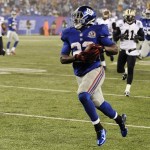 New York Giants running back David Wilson (22) runs for a 52-yard touchdown against the New Orleans Saints during the second half of an NFL football game, Sunday, Dec. 9, 2012, in East Rutherford, N.J. (AP Photo/Bill Kostroun)