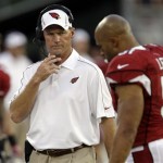 Arizona Cardinals head coach Ken Whisenhunt, left, watches as 
Arizona Cardinals linebacker Paris Lenon (51) heads to the bench after 
being injured during the first quarter of the Hall of Fame exhibition 
football game against the New Orleans Saints, Sunday, Aug. 5, 2012 in 
Canton, Ohio. (AP Photo/Gene J. Puskar)
