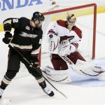  Phoenix Coyotes goalie Thomas Greiss, right, blocks a shot by Anaheim Ducks left wing Patrick Maroon during the second period of an NHL hockey game in Anaheim, Calif., Saturday, Dec. 28, 2013. (AP Photo/Chris Carlson)
