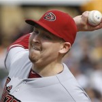 Arizona Diamondbacks starting pitcher Trevor Cahill throws in the first inning of the baseball game against the Pittsburgh Pirates on Saturday, Aug. 17, 2013, in Pittsburgh. (AP Photo/Keith Srakocic)