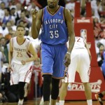 Oklahoma City Thunder's Kevin Durant (35) reacts after making a three-point basket against the Houston Rockets during the closing seconds of the fourth quarter of Game 3 in a first-round NBA basketball playoff series Saturday, April 27, 2013, in Houston. The Thunder beat the Rockets 104-101. (AP Photo/David J. Phillip)