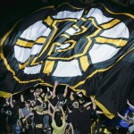 Boston Bruins fans pass a big Bruins flag through the stands before Game 6 of the NHL hockey Stanley Cup Finals between the Boston Bruins and the Chicago Blackhawks, Monday, June 24, 2013, in Boston. (AP Photo/Charles Krupa)