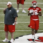 Kansas City Chiefs wide receiver Junior Hemingway (88) runs past coach Andy Reid during NFL football rookie minicamp at the team's practice facility in Kansas City, Mo., Saturday, May 11, 2013. (AP Photo/Orlin Wagner)
