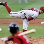 Arizona Diamondbacks starting pitcher Randall Delgado delivers in the first inning during a baseball game against the Boston Red Sox at Fenway Park in Boston, Friday, Aug. 2, 2013. (AP Photo/Charles Krupa)
