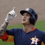 Houston Astros' Brandon Barnes reacts after hitting a home run off Philadelphia Phillies Jeremy Horst during the seventh inning of an exhibition spring training baseball game, Saturday, Feb. 23, 2013, in Clearwater, in Fla. Houston won 8-3. (AP Photo/Matt Slocum)
