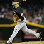 Florida Marlins pitcher Nathan Eovaldi delivers a pitch against the Arizona Diamondbacks during the first inning of a baseball game, Tuesday, June 18, 2013, in Phoenix. (AP Photo/Matt York)