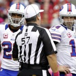 Buffalo Bills quarterback Ryan Fitzpatrick (14) and teammate Fred Jackson looks at referee Al Riveron (57 )during the first half on an NFL football game against the Arizona Cardinals, Sunday, Oct. 14, 2012, in Glendale, Ariz. (AP Photo/Rick Scuteri)