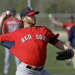 Boston Red Sox pitcher Ryan Dempster throws a bullpen session during a spring training workout Wednesday, Feb. 13, 2013, in Fort Myers, Fla. (AP Photo/Chris O'Meara)