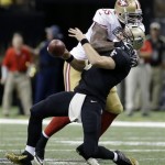 New Orleans Saints quarterback Drew Brees (9) is sacked by San Francisco 49ers outside linebacker Ahmad Brooks (55) in the second half of an NFL football game in New Orleans, Sunday, Nov. 17, 2013. (AP Photo/Dave Martin)