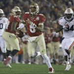  Florida State's Jameis Winston scrambles during the second half of the NCAA BCS National Championship college football game against Auburn Monday, Jan. 6, 2014, in Pasadena, Calif. (AP Photo/David J. Phillip)